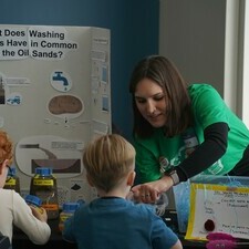 Anya explaining bitumen to kids