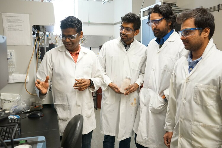 Engineering professor Arvind Rajendran (left) in his lab with graduate students Vishal Subramanian Balashankar, Kasturi Nagesh Pai and Gokul Subraveti.