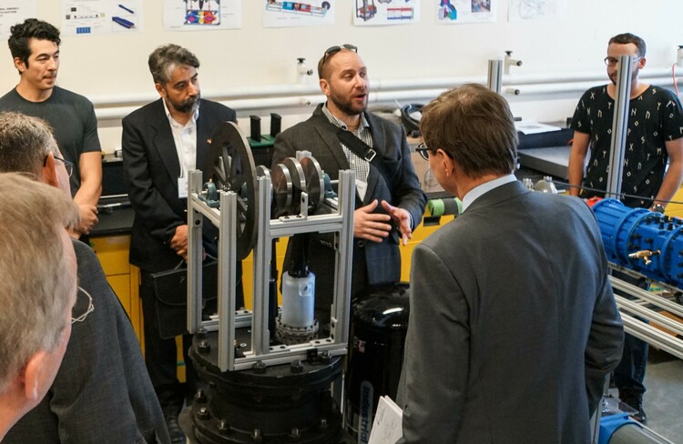 Future Energy Systems Principal Investigator Jonathan Banks leads a tour of the Dynamic Thermal Energy Conversion Laboratory in 2017. 