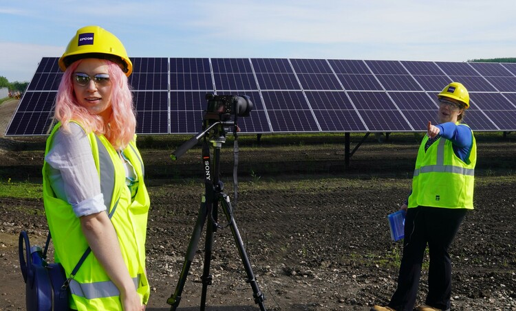 FES Communication team members Kaitlin Pylypa and Valerie Miller film a new storytime video at the EPCOR kīsikāw pīsim solar farm.