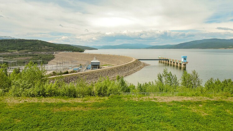 The W.A.C. Bennett Dam on the Peace River in northern British Columbia. A full two-way roadway runs on top of the dam and it is about as high as Edmonton's second tallest tower, the JW Marriott. (Photo: Evan Arbuckle)
