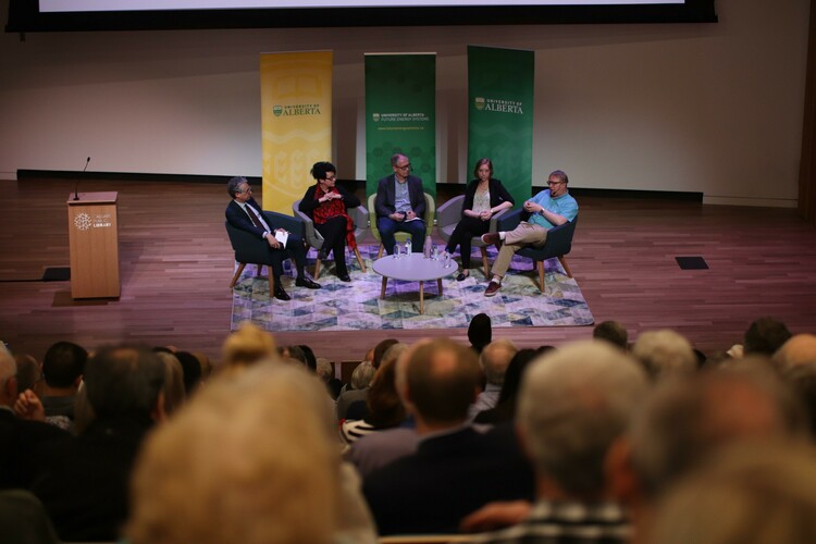 Director Anne Naeth and researchers John Parkins, Steve Bergens, and graduate student Maggie Cascadden participate in a panel discussion at the Calgary Public Library.