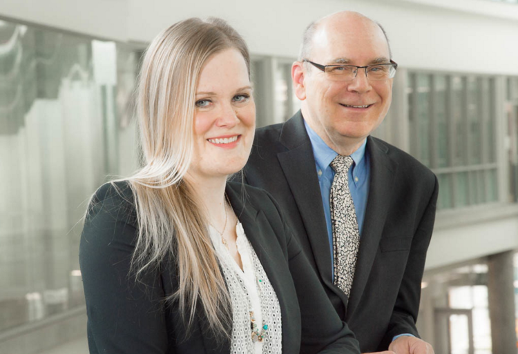 Research Services Office Contract Specialist Jennifer Morrison and Future Energy Systems Director Larry Kostiuk.