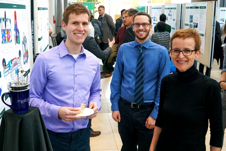 Solar theme leader and Principal Investigator Dr. Jillian Buriak meeting graduate students Connor Speer and Jason Michaud from the geothermal theme.