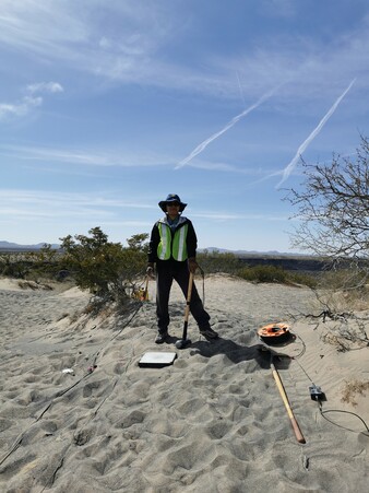 Jingchuan poses with seismic equipment