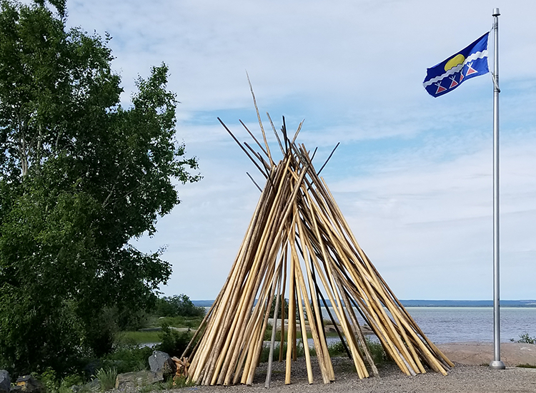 The Tłı̨chǫ Government flag flies in the NWT