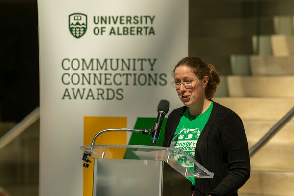 Dr. Valerie Miller accepts the Community Leader (Team) Award for Energy Explorers