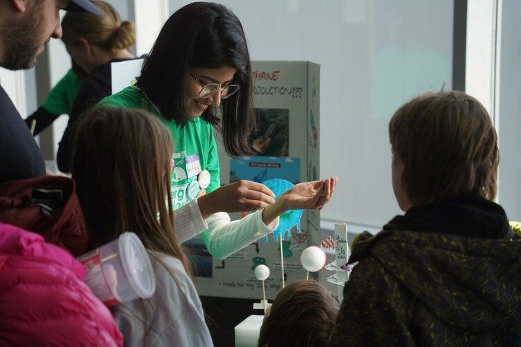 Iram teaching kids about her research