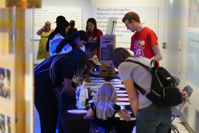 A group of people gather to learn about climate change and public health